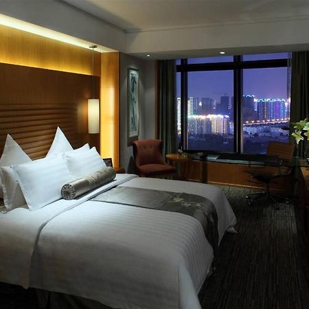 New City Garden Hotel Σουτσόου Δωμάτιο φωτογραφία